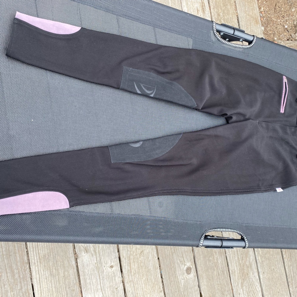 Horse riding knee patches breeches. Black ribbed with purple trim. Size 26L
